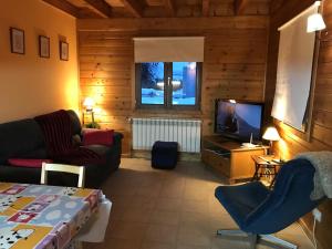 TV a/nebo společenská místnost v ubytování ESTANYOL - Vall d'Incles - Soldeu Hut 5896