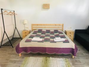 Postel nebo postele na pokoji v ubytování Sno House in Kazbeg