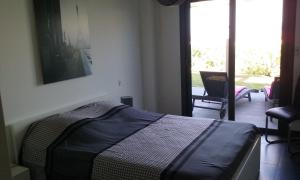 Postel nebo postele na pokoji v ubytování Appart 8 pers vue sur baie - Porticcio
