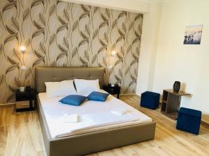 Postel nebo postele na pokoji v ubytování Byzanthin rooms + 46 fotografií