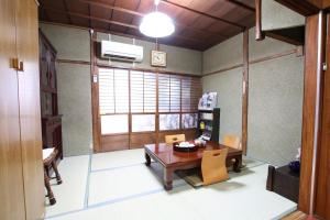 Зона вітальні в RINKA Minpaku / Vacation STAY 1105
