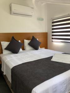 AdaHan Family Rooms Gocek客房内的一张或多张床位