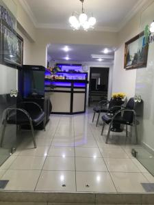 a barber shop with chairs and a barber shop at Serendi Apart Hotel in Alanya