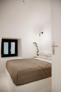 Letto o letti in una camera di Aleria Luxury Cave Santorini
