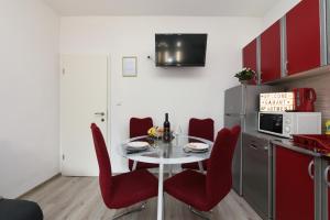 Kuchyň nebo kuchyňský kout v ubytování Apartmani Damant