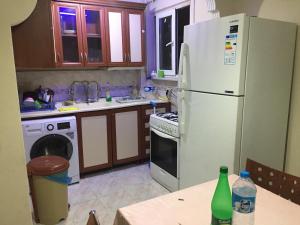 Kuchyň nebo kuchyňský kout v ubytování Yakup's Apartment