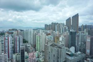 a view of a city with tall buildings at Hotel Ease Mong Kok in Hong Kong