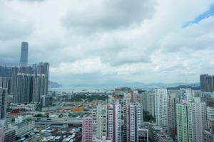 a view of a city with many tall buildings at Hotel Ease Mong Kok in Hong Kong