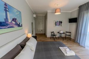 TV a/nebo společenská místnost v ubytování PATTY'S GUESTHOUSE