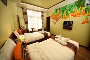 Voodi või voodid majutusasutuse Hotel Osho Home toas