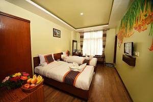 Voodi või voodid majutusasutuse Hotel Osho Home toas