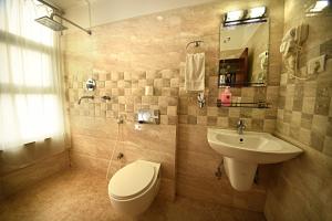 Vannituba majutusasutuses Hotel Osho Home