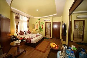 Voodi või voodid majutusasutuse Hotel Osho Home toas