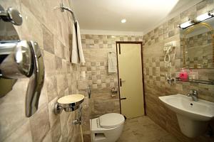 Vannituba majutusasutuses Hotel Osho Home