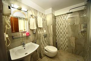 Vannituba majutusasutuses Hotel Osho Home