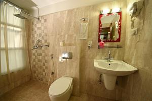 Vannituba majutusasutuses Hotel Osho Home