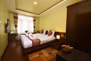 Voodi või voodid majutusasutuse Hotel Osho Home toas