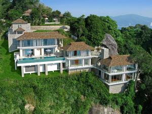 an aerial view of a house on a cliff at Villa Minh in Kamala Beach