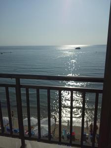a view of the beach from the balcony at Nepheli in Paralia Katerinis