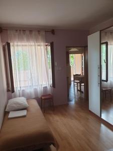 Postel nebo postele na pokoji v ubytování Apartments Davorka