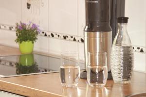 Příslušenství pro přípravu čaje a kávy v ubytování AllgäuBlick - Die Ferienwohnung + 9 fotografií