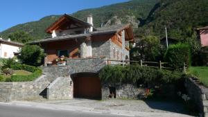 a house on the side of a mountain at La Casa Della Guida in Pontey