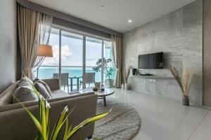 Et sittehjørne på Mövenpick Residence/1BR/Beach Access/Luxury Stay