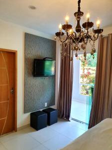 Μια τηλεόραση ή/και κέντρο ψυχαγωγίας στο Linda casa em Paraty
