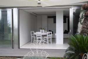 Patio nebo venkovní prostory v ubytování Acquabianca