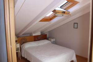 A bed or beds in a room at Duplex para 6 en Cercs, Berga - A 30 mins del Pedraforca