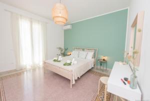En eller flere senge i et værelse på Casa Martini Mondello