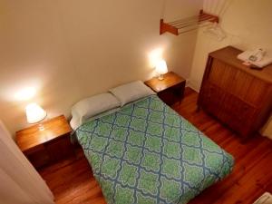 Postel nebo postele na pokoji v ubytování Cappuccio Hotel