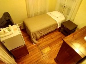 Postel nebo postele na pokoji v ubytování Cappuccio Hotel