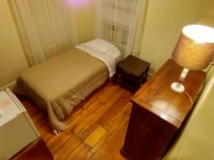 Postel nebo postele na pokoji v ubytování Cappuccio Hotel