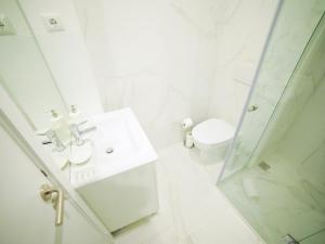 Vannituba majutusasutuses Angel Flat +22 fotot