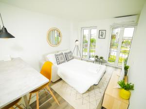 Voodi või voodid majutusasutuse Angel Flat toas