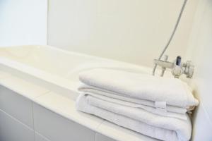 Koupelna v ubytování Gt Home encorp strand residence (alpha ivf )