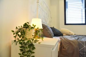 Postel nebo postele na pokoji v ubytování Gt Home encorp strand residence (alpha ivf )