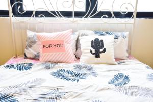 Postel nebo postele na pokoji v ubytování Gt Home encorp strand residence (alpha ivf )