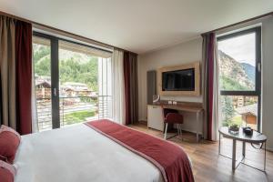 Posteľ alebo postele v izbe v ubytovaní TH Courmayeur + 37 fotografií
