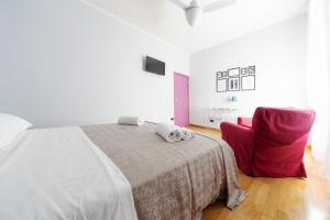 Posteľ alebo postele v izbe v ubytovaní Sant'Orsola Colorful Huge Apartment
