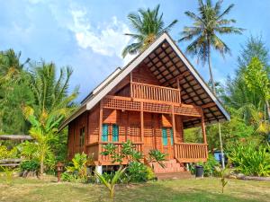 Zahrada ubytování Bayu Lestari Island Resort + 33 fotografií