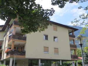 a building with balconies on the side of it at Appartamento Panoramico Lungopassirio in Merano