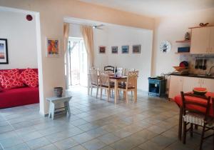 A seating area at Pine Trees and Sea View Houses in Hydra - Daphne, Chloe, Myrto, Eleni