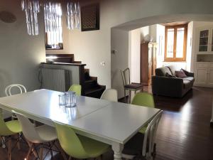 a living room with a white table and chairs at Maison Elodie in Narni +14 photos
