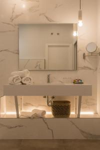 Vonios kambarys apgyvendinimo įstaigoje TRIA NOMINA Apartamentos Turísticos