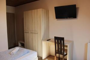 Postel nebo postele na pokoji v ubytování Natúra Panzió&Apartmanház