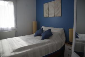 Ένα ή περισσότερα κρεβάτια σε δωμάτιο στο Gîte la Briantaise