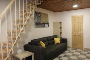 Posezení v ubytování Natúra Panzió&Apartmanház
