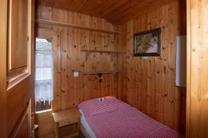 Katil atau katil-katil dalam bilik di Hotel de Moiry Supérieur